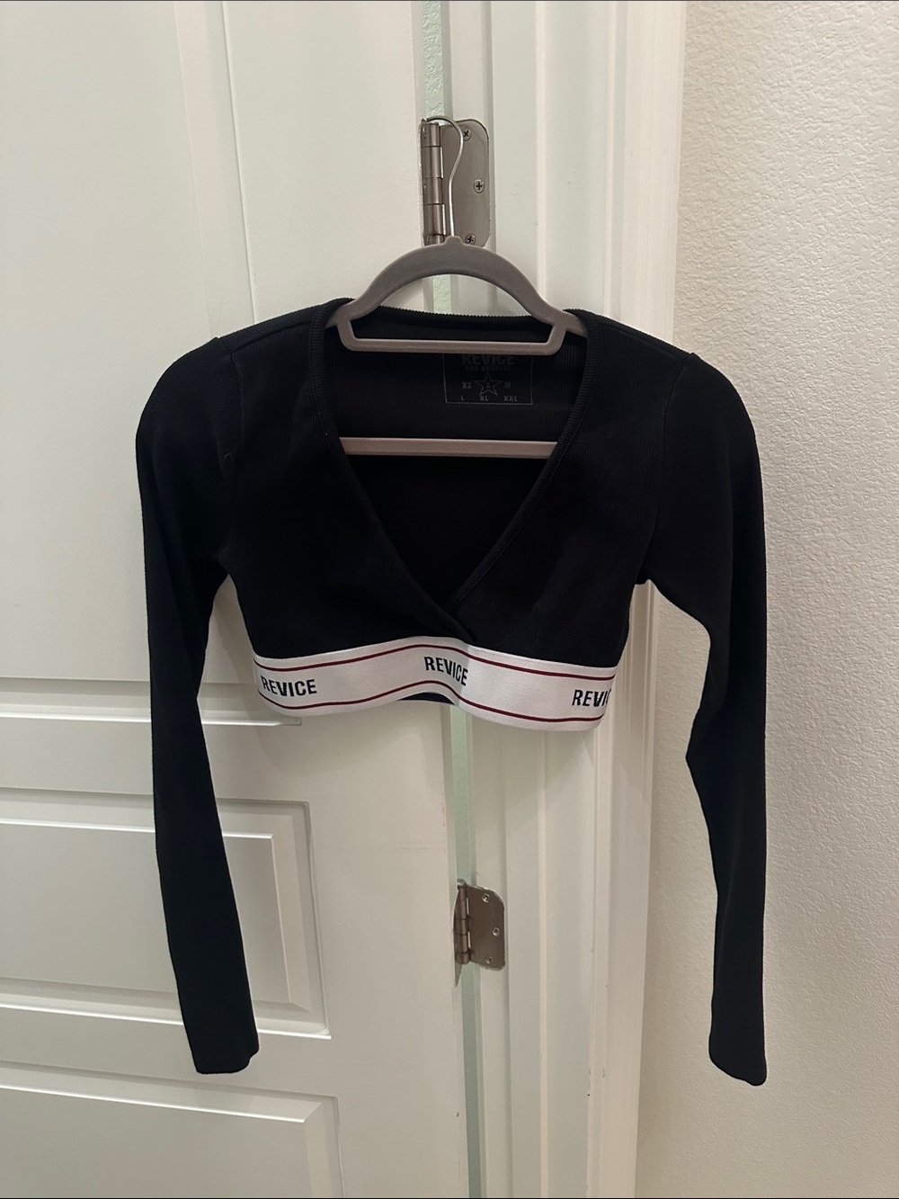 REVICE Black Cropped Wrap Long-Sleeve Top with Branded Band